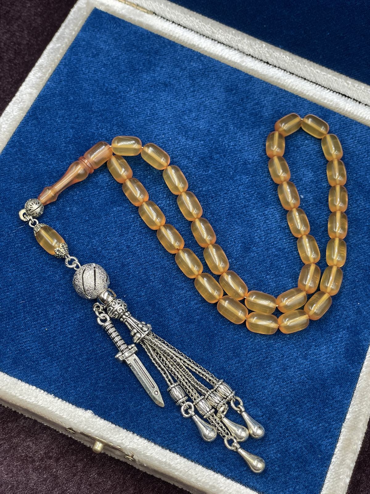 Alpaka Kılıç Detaylı Buğulu Hamur Ateş Kehribar Tesbih (7x11 mm)